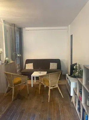 Coin salon dans l'établissement Appart charmant à Montmartre