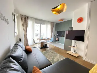 Télévision ou salle de divertissement dans l'établissement Le Charme des Docks by So Homy - 1 Bed Room - 4 PAX
