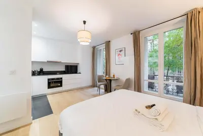 Un ou plusieurs lits dans un hébergement de l'établissement Studio refait a neuf montmartre - paris 18 - 2P - FLAT-GUEST