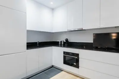 Cuisine ou kitchenette dans l'établissement Studio refait a neuf montmartre - paris 18 - 2P - FLAT-GUEST