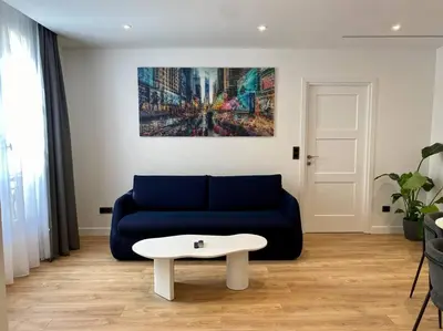 Coin salon dans l'établissement Renovated Apartment near Tuileries and Concorde