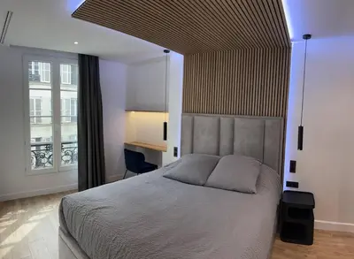 Un ou plusieurs lits dans un hébergement de l'établissement Renovated Apartment near Tuileries and Concorde