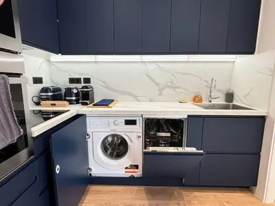 Cuisine ou kitchenette dans l'établissement Renovated Apartment near Tuileries and Concorde