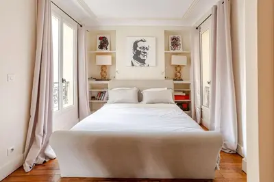 Un ou plusieurs lits dans un hébergement de l'établissement Lovely Appartment Montmartre - View Sacré coeur