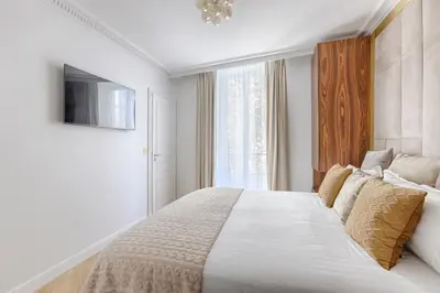 Un ou plusieurs lits dans un hébergement de l'établissement Stunning 1 bedroom for 4 near Montparnasse