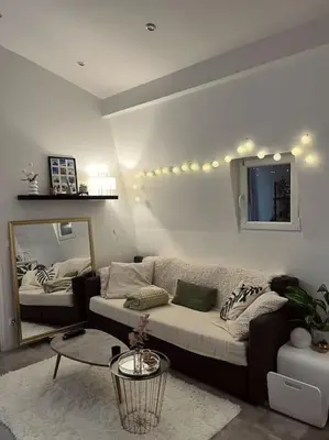 Coin salon dans l'établissement Appartement T2 - Vue Tour Eiffel