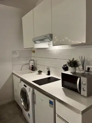Cuisine ou kitchenette dans l'établissement Appartement T2 - Vue Tour Eiffel