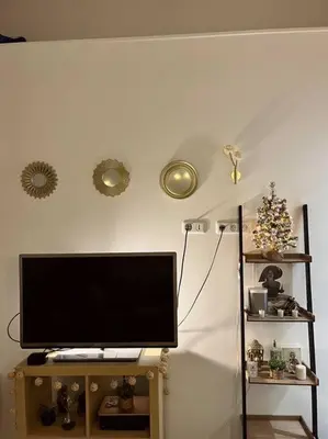 Télévision ou salle de divertissement dans l'établissement Appartement T2 - Vue Tour Eiffel