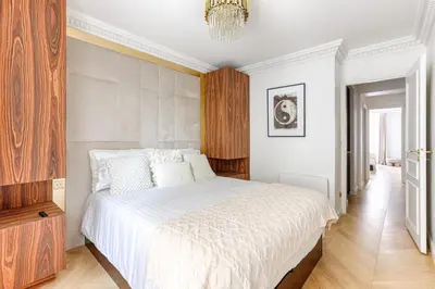 Un ou plusieurs lits dans un hébergement de l'établissement Stunning 2 bedroom at Montparnasse