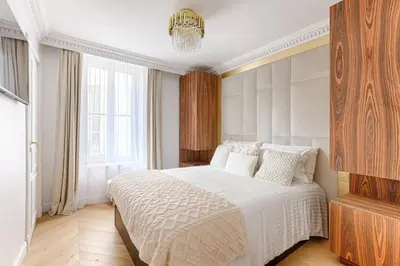 Un ou plusieurs lits dans un hébergement de l'établissement Stunning 2 bedroom at Montparnasse