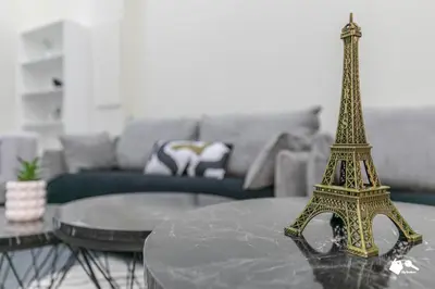 Coin salon dans l'établissement MBA - Lecourbe Splendide Appartement