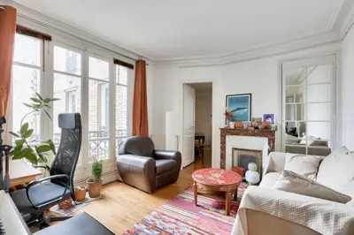 Coin salon dans l'établissement Appart confort moderne près Montmartre