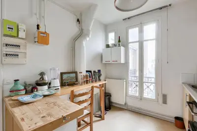 Cuisine ou kitchenette dans l'établissement Appart confort moderne près Montmartre