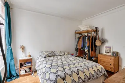 Un ou plusieurs lits dans un hébergement de l'établissement Appart confort moderne près Montmartre
