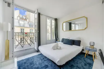 Un ou plusieurs lits dans un hébergement de l'établissement My Parisian Terrasse