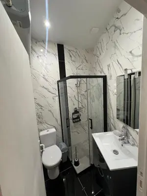 Salle de bains dans l'établissement Le Havre Montmartrois 2