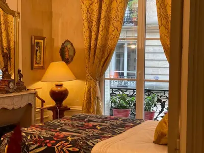 Un ou plusieurs lits dans un hébergement de l'établissement Appartement au cœur du quartier Butte Montmartre