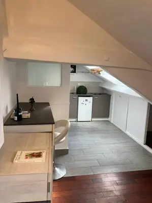Cuisine ou kitchenette dans l'établissement Au Cœur de Montmartre