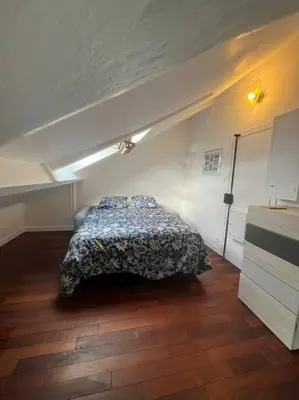 Un ou plusieurs lits dans un hébergement de l'établissement Au Cœur de Montmartre