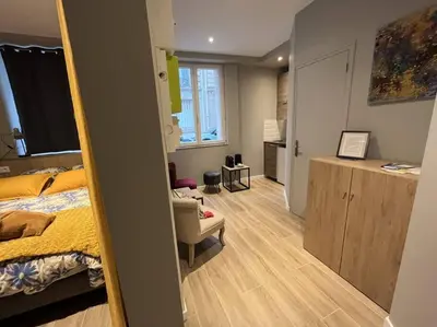 Un ou plusieurs lits dans un hébergement de l'établissement Appartement