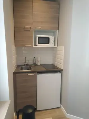Cuisine ou kitchenette dans l'établissement Appartement