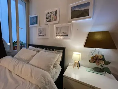 Un ou plusieurs lits dans un hébergement de l'établissement Appartement Paris 10 arr