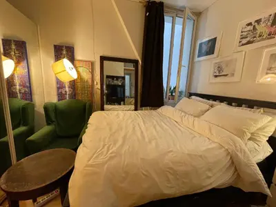 Un ou plusieurs lits dans un hébergement de l'établissement Appartement Paris 10 arr