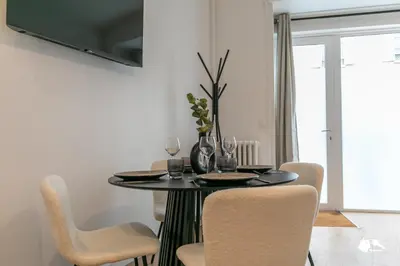 Télévision ou salle de divertissement dans l'établissement MBA - Boulangers Splendide Appartement