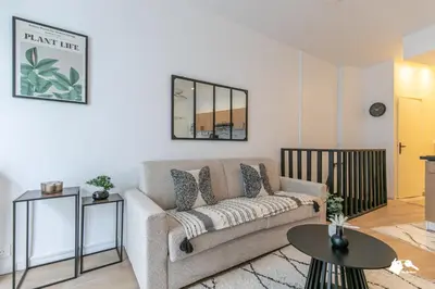 Coin salon dans l'établissement MBA - Boulangers Splendide Appartement