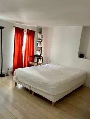 Un ou plusieurs lits dans un hébergement de l'établissement Paris Montorgueil