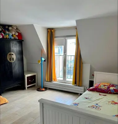 Un ou plusieurs lits dans un hébergement de l'établissement Paris Montorgueil