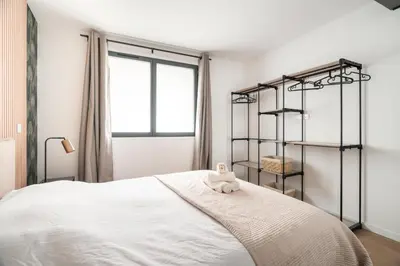 Un ou plusieurs lits dans un hébergement de l'établissement Charming new apartments in Paris