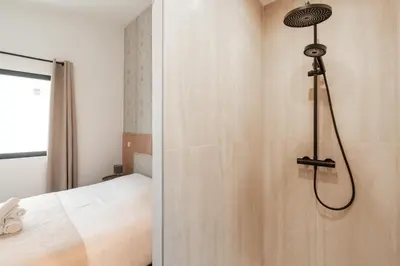 Un ou plusieurs lits dans un hébergement de l'établissement Charming new apartments in Paris