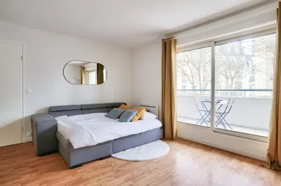 Un ou plusieurs lits dans un hébergement de l'établissement New & Cozy T2 with Balcony - Paris 18 Montmartre