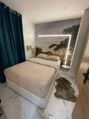 Un ou plusieurs lits dans un hébergement de l'établissement Magnifique appartement à Paris