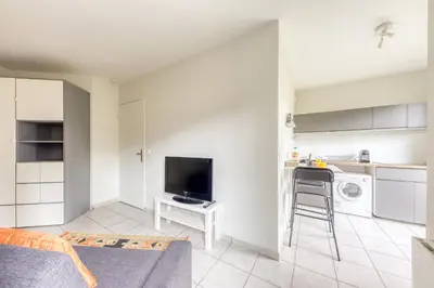 Cuisine ou kitchenette dans l'établissement Le Haven Stade de France renty