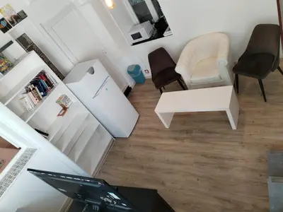 Cuisine ou kitchenette dans l'établissement Logement calme et spacieux