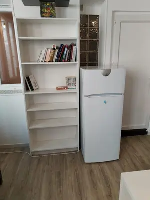 Cuisine ou kitchenette dans l'établissement Logement calme et spacieux