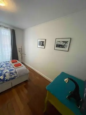 Un ou plusieurs lits dans un hébergement de l'établissement Spacious and convenient 2 BR flat in Paris centre