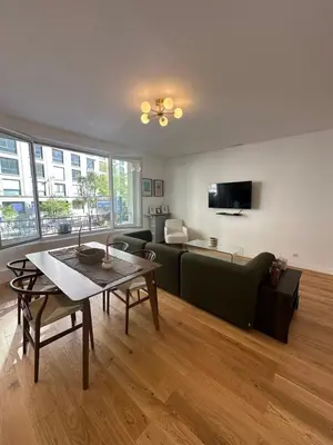 Télévision ou salle de divertissement dans l'établissement Appartement Trocadéro