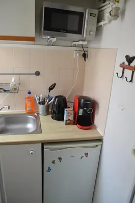 Cuisine ou kitchenette dans l'établissement Studio Paris 18