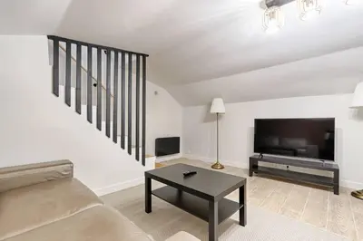 Télévision ou salle de divertissement dans l'établissement Appartement atypique au coeur de Batignolles