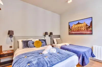 Un ou plusieurs lits dans un hébergement de l'établissement Urban Flat 111 - Urban Lovely Flat Madeleine