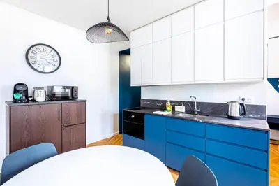 Cuisine ou kitchenette dans l'établissement Guestready - Tastefully decorated studio for 2