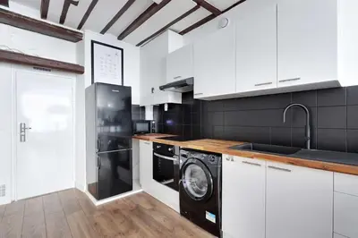 Cuisine ou kitchenette dans l'établissement Butte Aux Cailles Charming Studio 4P