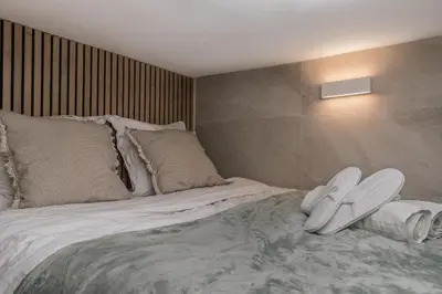 Un ou plusieurs lits dans un hébergement de l'établissement Cosy room inside Batignolles - L60