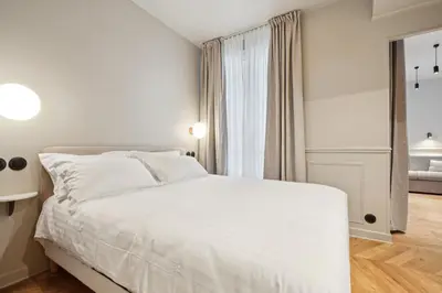 Un ou plusieurs lits dans un hébergement de l'établissement Hôtel Clémence