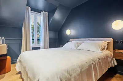 Un ou plusieurs lits dans un hébergement de l'établissement Hôtel Clémence