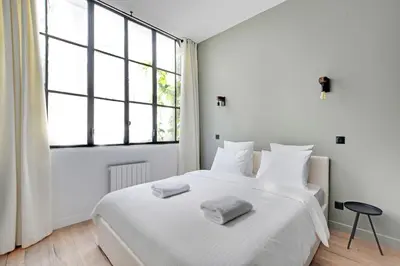 Un ou plusieurs lits dans un hébergement de l'établissement #2Bedroom#Cosy#Bastille#Voltaire#Paris11