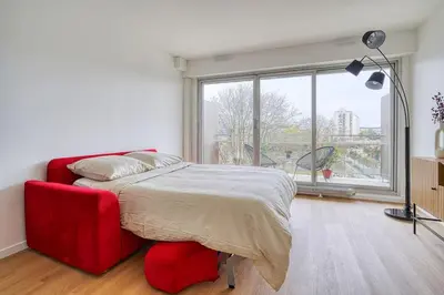 Un ou plusieurs lits dans un hébergement de l'établissement Appartement Luxueux Cosy - Paris Expo